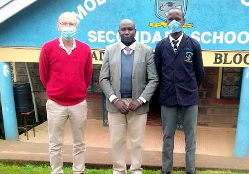 Joseph with Johny Onslow of Vanessa Grant Trust and Victor (student supported with trust)